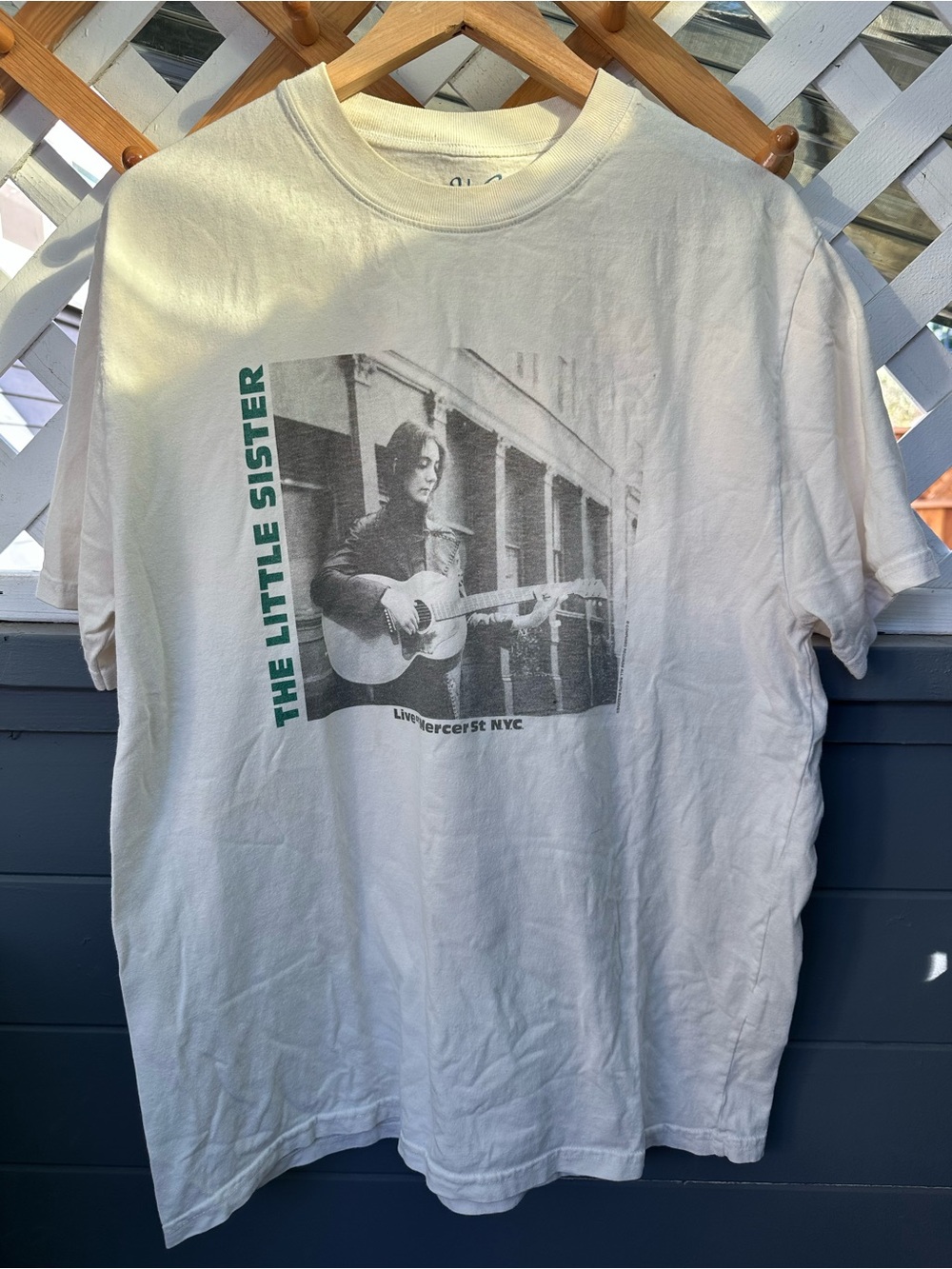 White Graphic Tee with Green Text